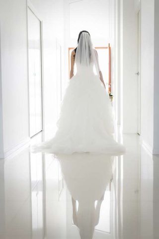 bride portrait of dress with reflection